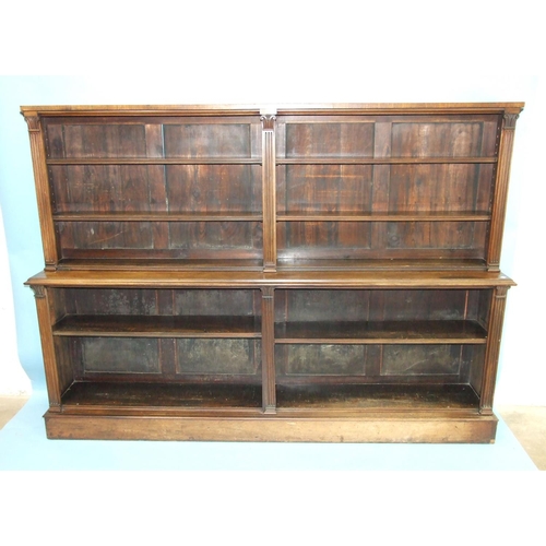 110 - A large 19th century rosewood open sectional low bookcase, the shallow upper part with four shelves ... 