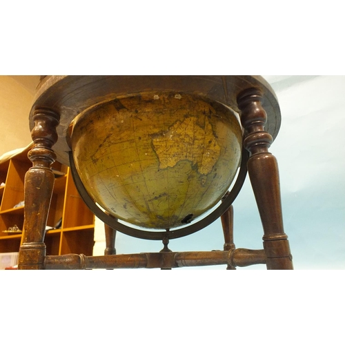 154 - A Manning's table-top terrestrial globe of 12'' diameter, within bronze brass meridian ring, the hor... 