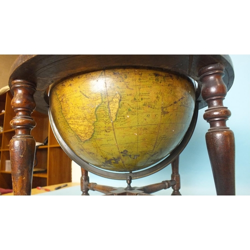 154 - A Manning's table-top terrestrial globe of 12'' diameter, within bronze brass meridian ring, the hor... 