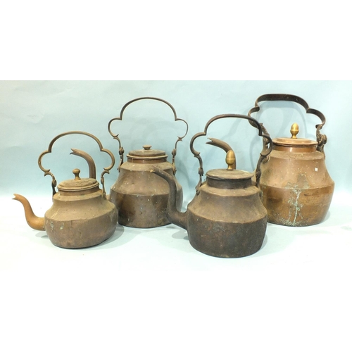 167 - Four late-19th century graduated copper and brass 'Dartmoor' kettles, each with elongated spout and ... 