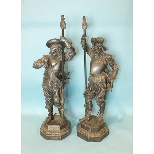 177 - A pair of spelter lamp holders in the form of Elizabethan military figures, 64cm high, (2).... 