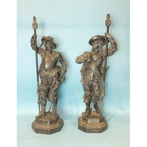 177 - A pair of spelter lamp holders in the form of Elizabethan military figures, 64cm high, (2).... 