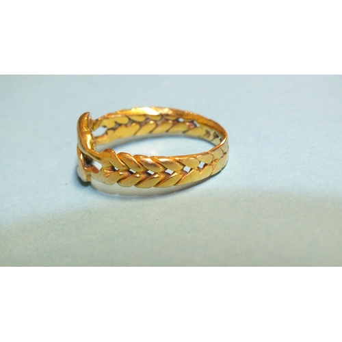 284 - An 18ct gold knot ring with 'plaited' shank, size S, 4.8g.