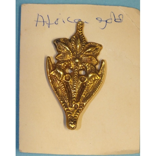 290 - An unusual yellow metal floral brooch, (tests as high-carat gold), 4.4cm long, 8g.