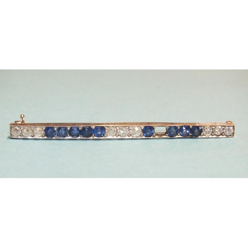 292 - An Art Deco sapphire and diamond bar brooch set three triplets of old brilliant-cut diamonds, with t... 