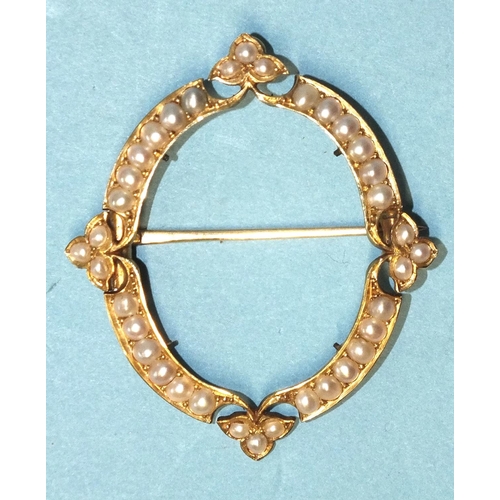 296 - A Victorian gold brooch frame set demi-pearls of oval form, with four pearl triplets, possibly for a... 