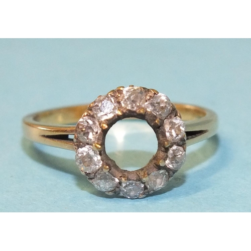 299 - A diamond ring set a ring of ten old brilliant-cut diamonds, centre stone lacking, unmarked, tests a... 