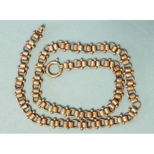 303 - A Victorian silver necklace of textured links, 43cm.