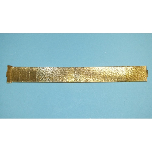 322 - A 9ct gold flexible bracelet of textured panels, 17cm long, 2cm wide, 25.5g, cased.