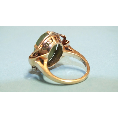 326 - A jade ring claw-set green jade cabochon, in rose gold mount, marked '15k', size L, 7.8g.... 