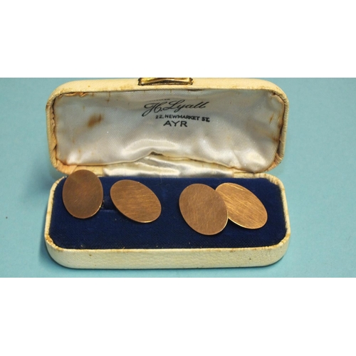 328 - A pair of 9ct rose gold plain oval cufflinks, 8.7g, (boxed).