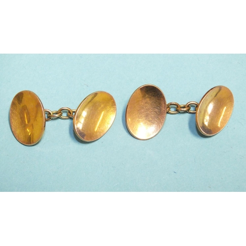 329 - A pair of 9ct rose gold cufflinks of oval dished form, 6.7g.