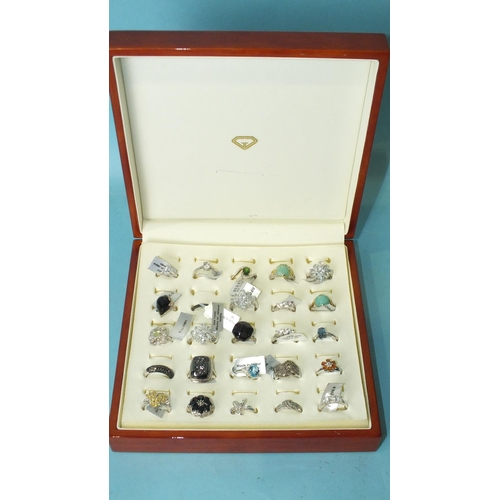 376 - Twenty-five modern gem-set rings with 925 silver mounts, mostly with original retail labels attached... 