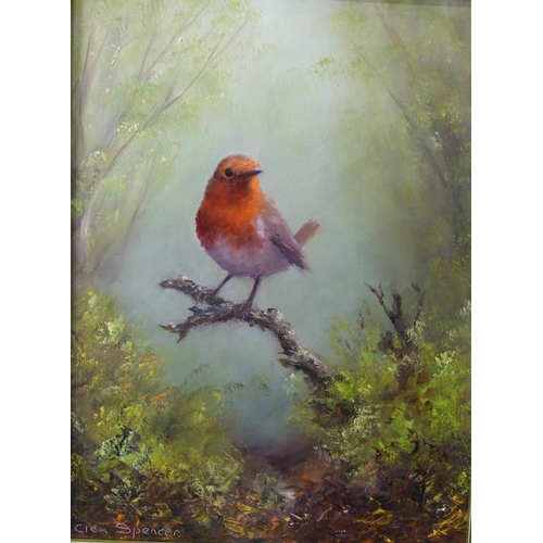 43 - Clem Spencer (British, 20th Century) A ROBIN PERCHED ON A BRANCH IN A WOODED GLADE Signed oil on boa... 