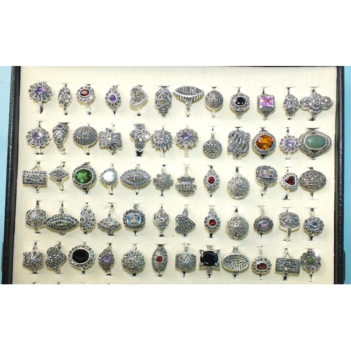 444 - Sixty silver rings set marcasite, some set coloured stones and pastes, all marked 'Silver', 273g, si... 