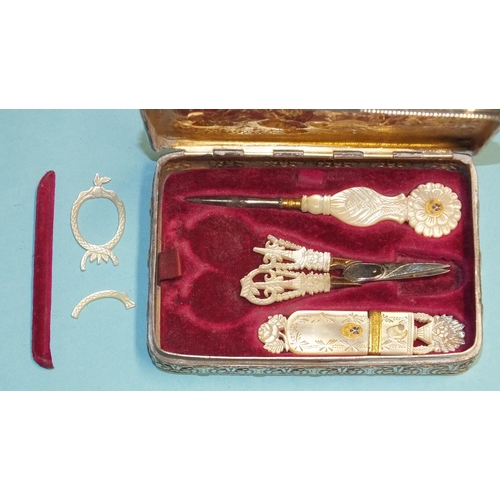 468 - A German silver etui of rectangular form, the lid with embossed scene of a couple and three children... 