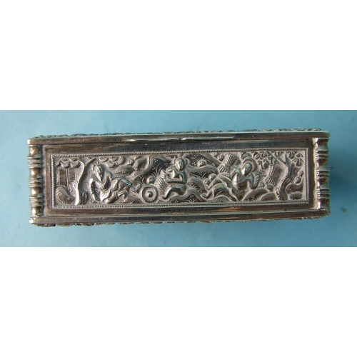 474 - A rectangular white metal snuff box decorated with chinoiserie scenes, 7cm.