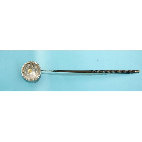 476 - A George III silver toddy ladle with embossed foliate and scroll decoration, inset a gold ¼-guinea c... 