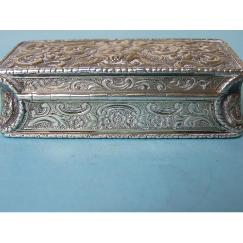 478 - A William IV rectangular snuff box with overall embossed decoration, 1831, 9cm.