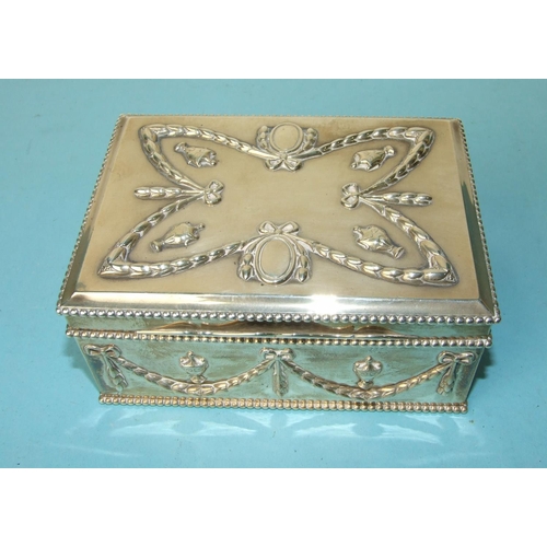 497 - A good-quality rectangular silver cigarette or jewellery box decorated in the classical style with r... 