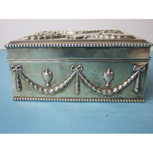 497 - A good-quality rectangular silver cigarette or jewellery box decorated in the classical style with r... 