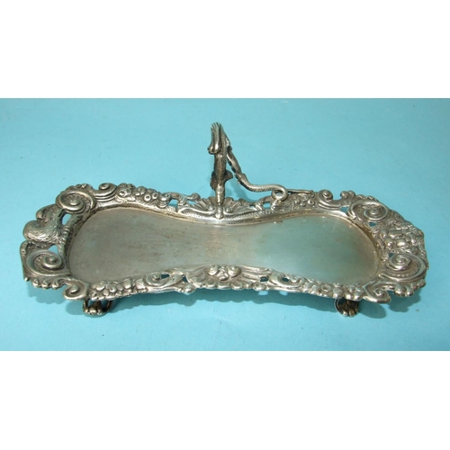 505 - A George IV snuffer tray, the border cast with shells, scrolls, masks and fruit, having serpent-form... 