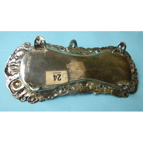 505 - A George IV snuffer tray, the border cast with shells, scrolls, masks and fruit, having serpent-form... 