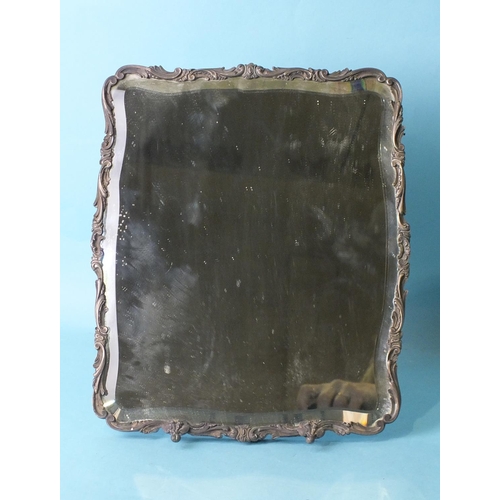 508 - A Victorian silver-strut metamorphic mirror of rectangular outline, the cast foliate frame and feet ... 