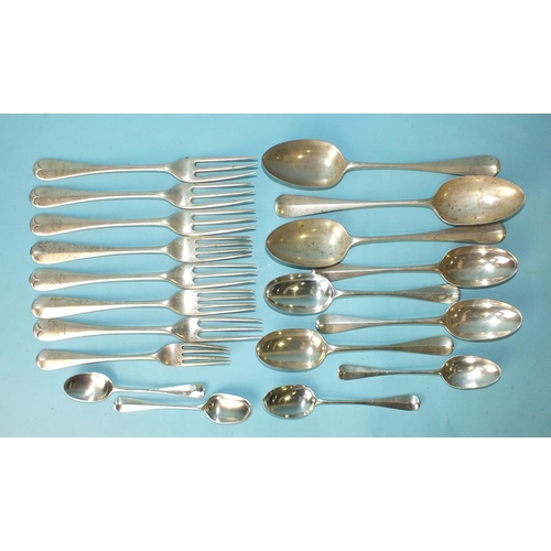 512 - A collection of Victorian Old English rattail flatware, comprising: seven table forks, three tablesp... 