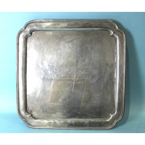 525 - A large square tray on tab feet with presentation inscription, London 1940, 35.5cm___50oz. &nbs... 