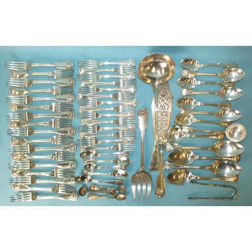 529 - A collection of mainly 19th century fiddle and shell pattern flatware, including a pair of fish serv... 