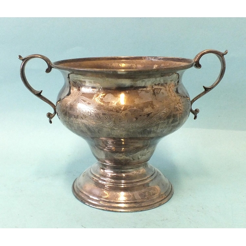 544 - A two-handled trophy cup of bellied form, on circular base, with engraved decoration, 12cm high, Lon... 