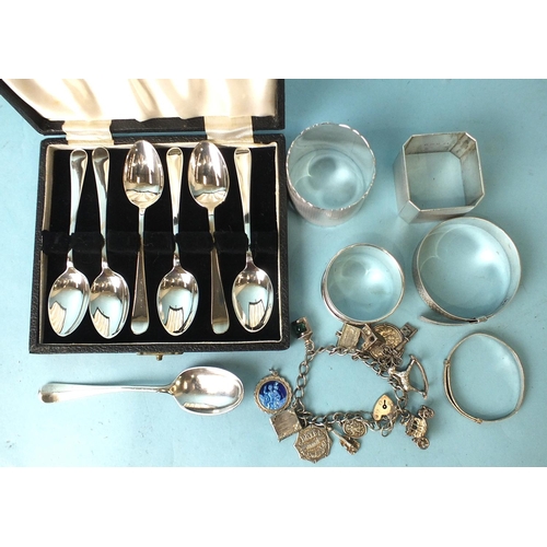 547 - Three various silver napkin rings, a cased set of six modern teaspoons and other items.... 