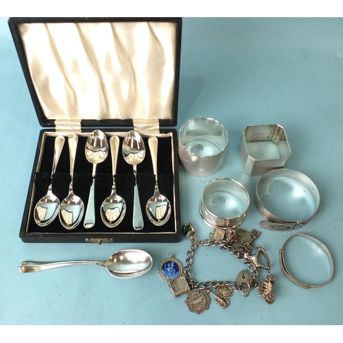 547 - Three various silver napkin rings, a cased set of six modern teaspoons and other items.... 