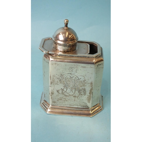 565 - A silver tea caddy by George Unite, of rectangular form with canted corners, the sliding top with re... 