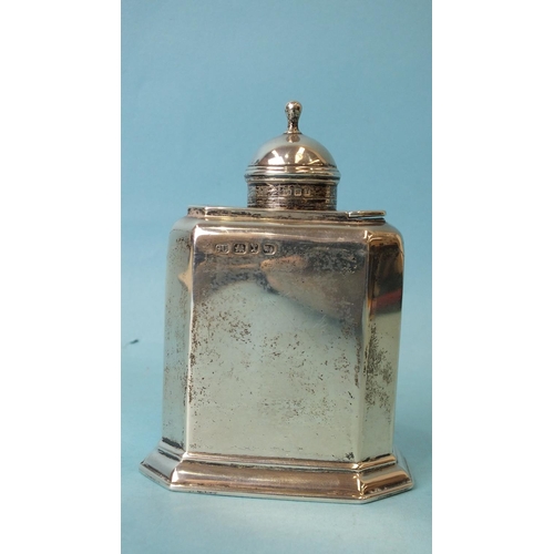 565 - A silver tea caddy by George Unite, of rectangular form with canted corners, the sliding top with re... 