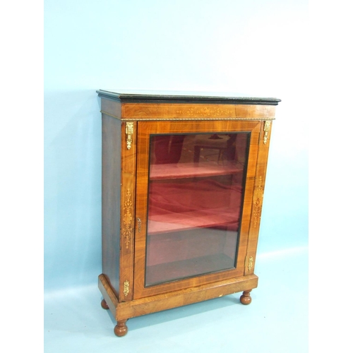 76 - A Victorian inlaid walnut gilt-metal-mounted dwarf bookcase, having a single glazed door, on short t... 