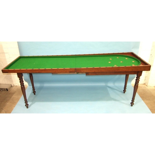 90 - An early-19th century mahogany bagatelle table, the folding top and baize lined interior with number... 