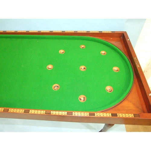 90 - An early-19th century mahogany bagatelle table, the folding top and baize lined interior with number... 