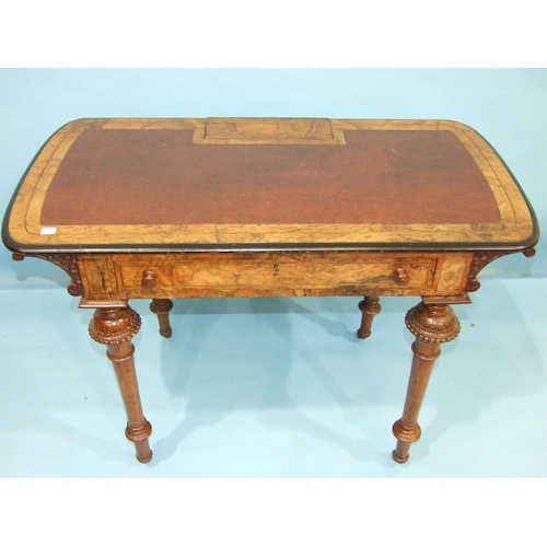 108 - A Victorian burr walnut writing table, the top with rising inkwell flap, (fitment lacking), above a ... 