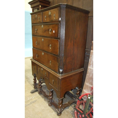 95 - A mainly-18th-century walnut partially-banded chest of two short and three long drawers, within flut... 