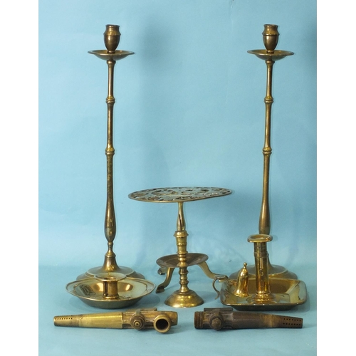 162 - An antique brass pricket candlestick of turned form, with drip pan, 17cm high, a pair of later altar... 