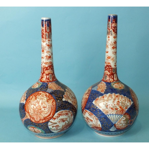 205 - A pair of late-19th century Arita bottle vases, 32cm high, (2).