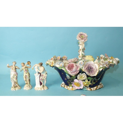 206 - Three late-19th century Continental porcelain figures, a sculptress and two musicians, 13cm high, (d... 