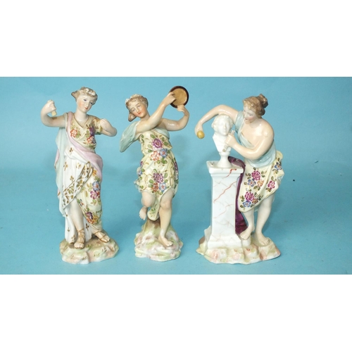 206 - Three late-19th century Continental porcelain figures, a sculptress and two musicians, 13cm high, (d... 