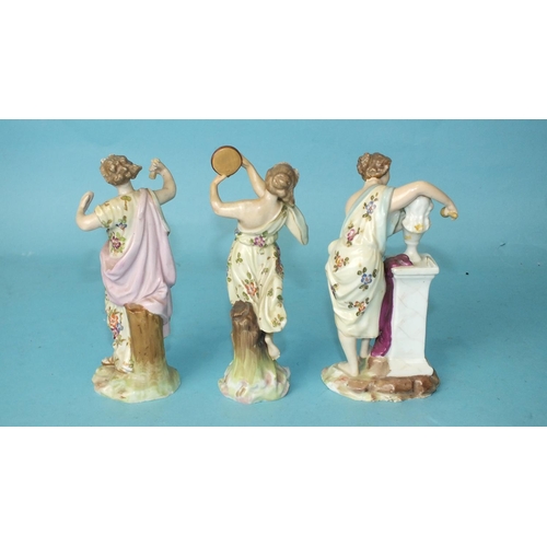 206 - Three late-19th century Continental porcelain figures, a sculptress and two musicians, 13cm high, (d... 