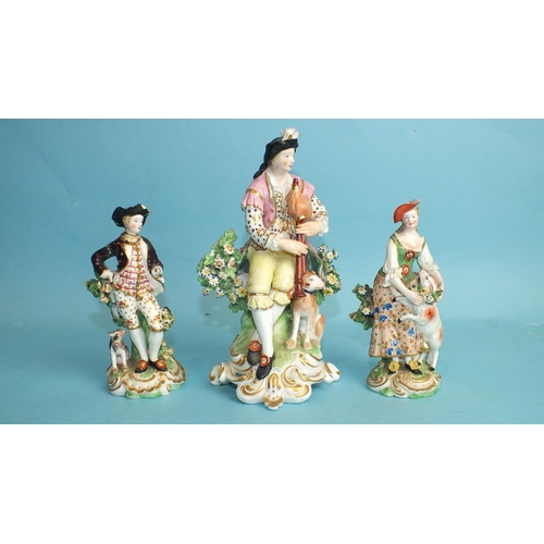 227 - An early-19th century Derby porcelain figure of a seated gentleman playing pipes and a pair of 19th ... 