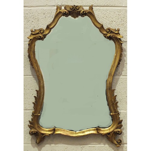 175 - A gilt carved wood mirror frame in the Chinese Chippendale taste, 184 x 61cm overall, with later mir... 