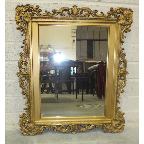 165 - A Victorian oval gilt gesso wall mirror with beaded and foliate scrolling frame, 85cm high, 58cm wid... 