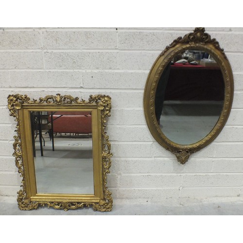 165 - A Victorian oval gilt gesso wall mirror with beaded and foliate scrolling frame, 85cm high, 58cm wid... 